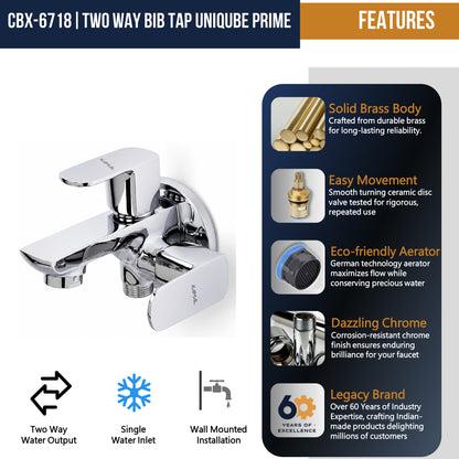 Kamal Cubix Prime two-way bib tap in full brass, featuring dual outlets and modern design, installed on a bathroom wall.