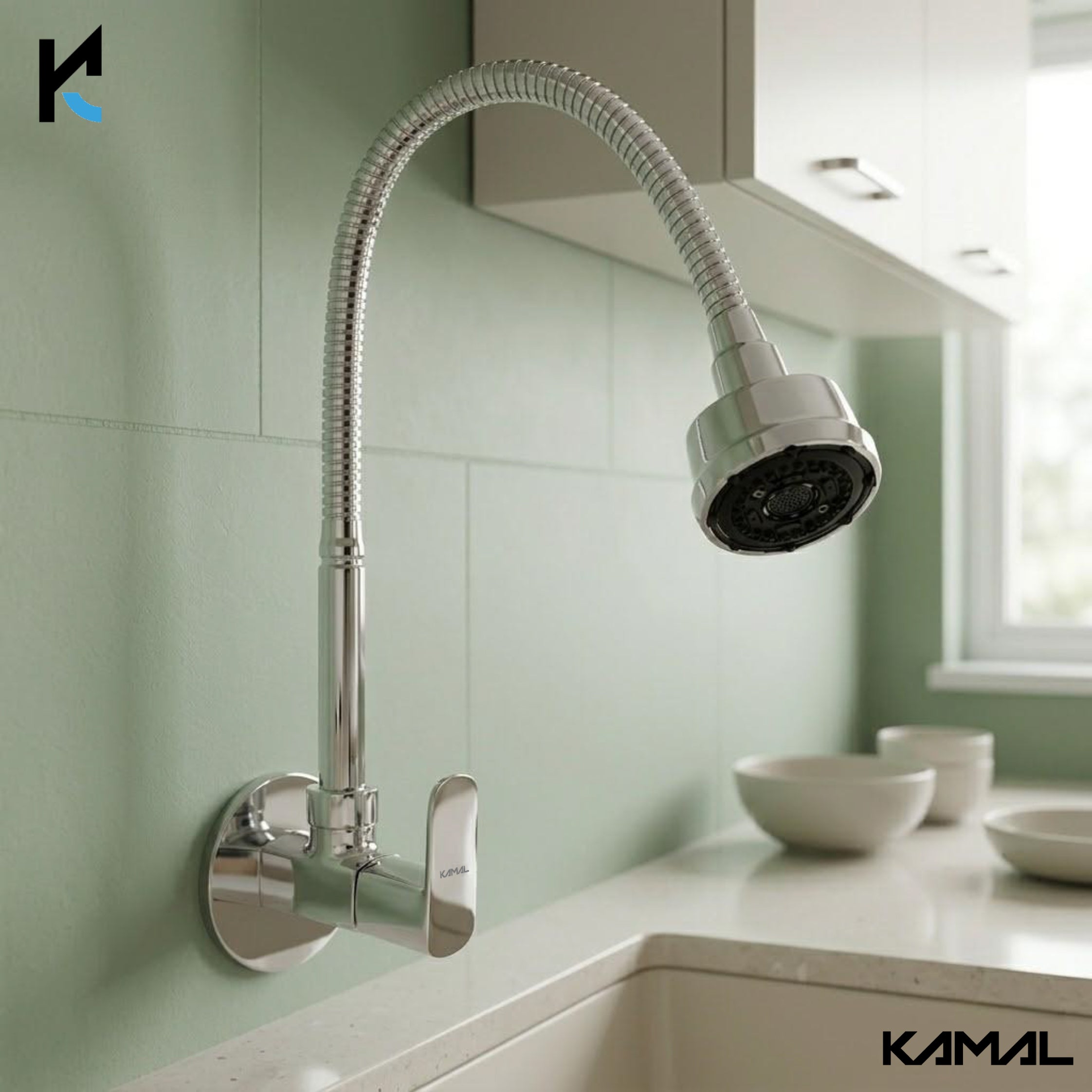 Kamal Cubix Prime sink spray tap in brass and stainless steel with a sleek design and flexible hose for kitchen use.